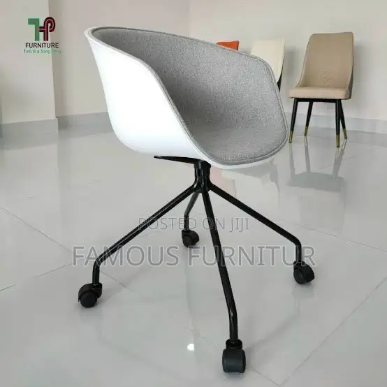 Modern Rolling Swivel Bucket Chairs Feature an Ergonomic Curve