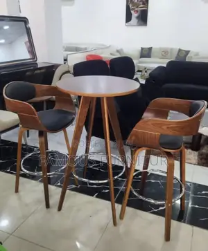 Modern Round Bar Table and Two Swivel Stool Set Appears to Curved