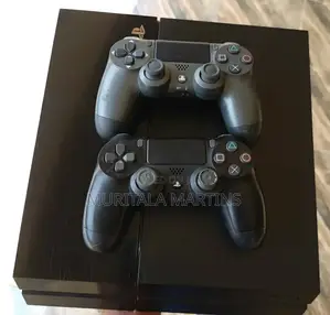 PS4 With 2 Pads and 12 Games Installed on It Already, Low Version .