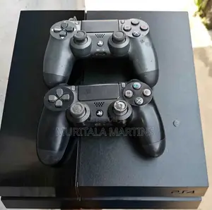 PS4 With 2 Pads and 12 Games Installed on It Already, Low Version .