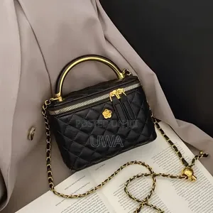 Women's Quilted Leather Vanity Crossbody Bag With Metallic Handle