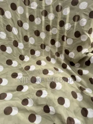 Elegant Brown Polka-Dot Fabric