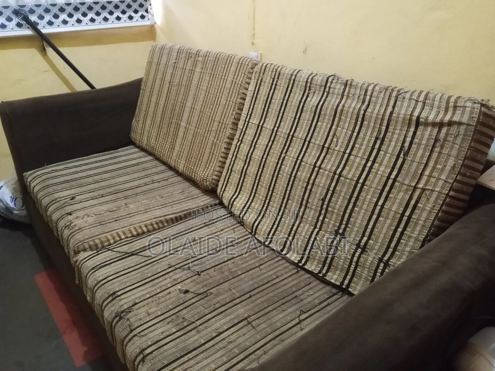 Fairly Used Three- Seater Couch