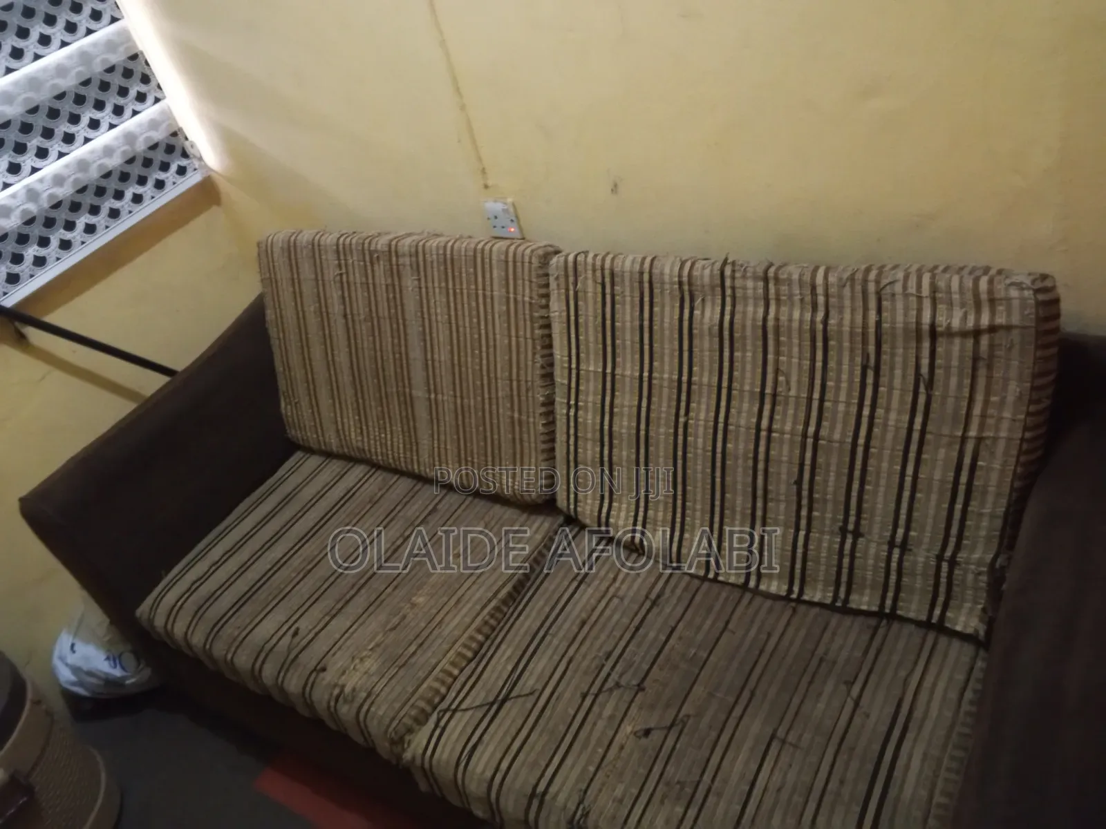 Fairly Used Three- Seater Couch