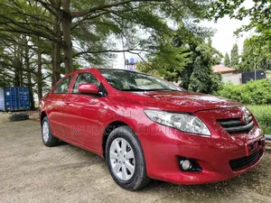 Toyota Corolla LE 4dr Sedan (1.8L 4 cyl 4A) 2009 Burgundy