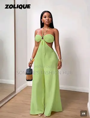 Zolique's Women's Textured Halter Neck Tie Strap Metal Buckle JumpSuit