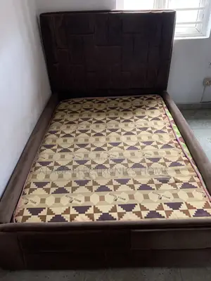 4 by 6 Bed Frame With High Quality Bed Foam. Few Months Used