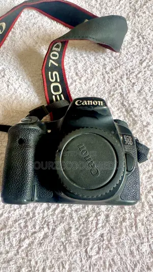 Canon 70D + 50mm + 18-135mm Lens + 2Batteries