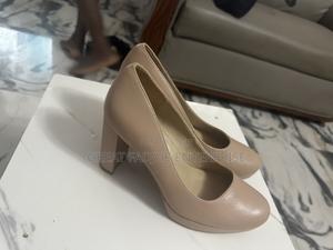 Elegant Nude Block-Heel Pumps