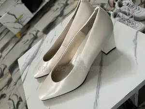 Elegant Cream Block-Heel Pumps