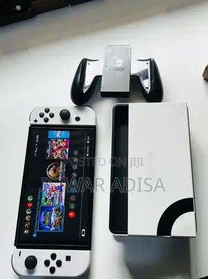 Nintendo Switched Oled for Sale With Account and Games