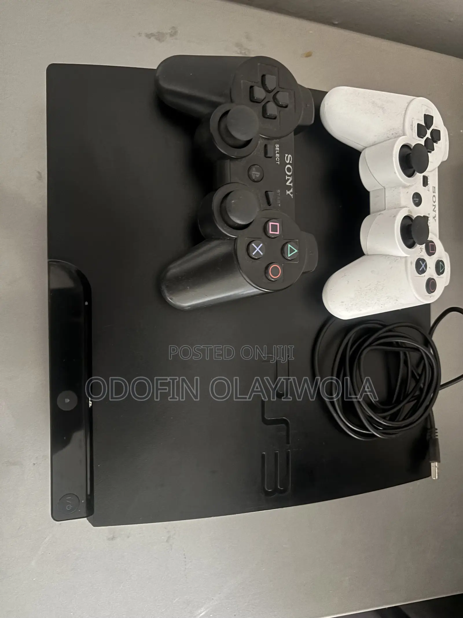 PS3 Slim 500GB + 2 Controller + 10 Games