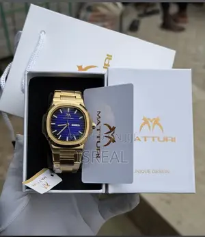 Matturi Gold Nautilus Blue Dial Chain Watch With Box