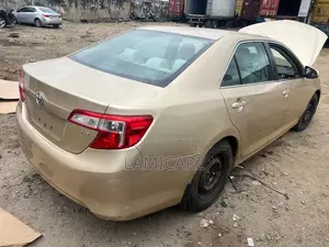 Toyota Camry LE 4dr Sedan (2.5L 4cyl 6A) 2013 Gold