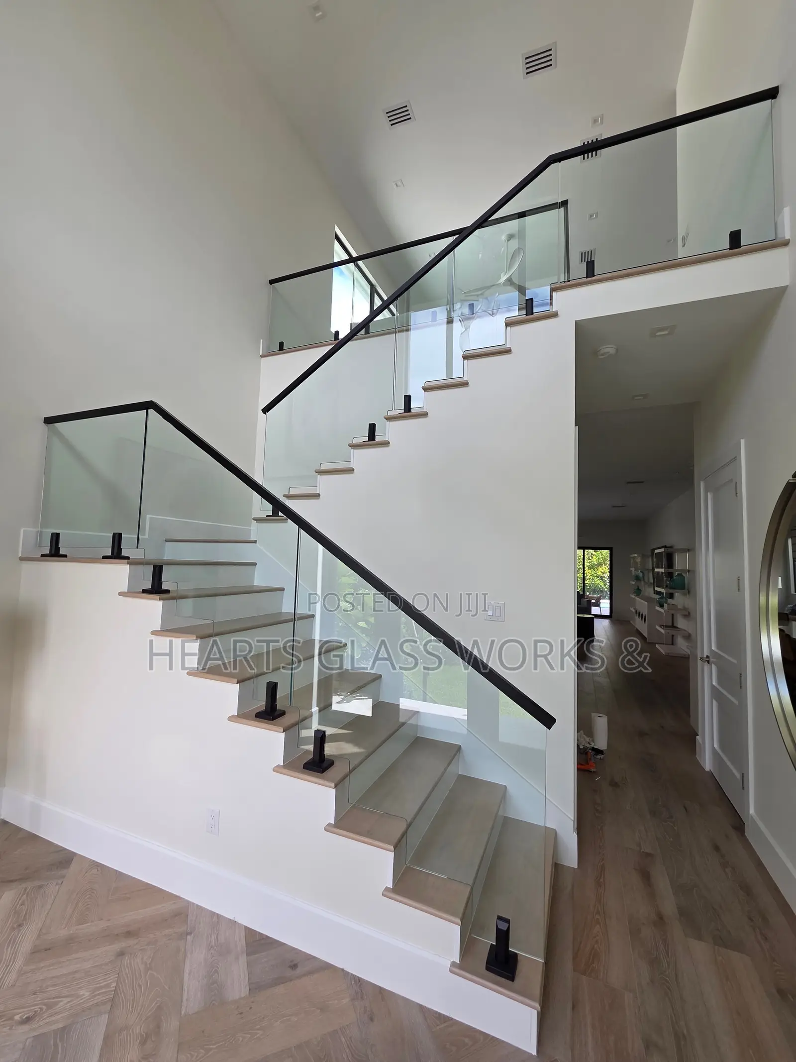 Modern Spigot Staircase Glass Railing Installation