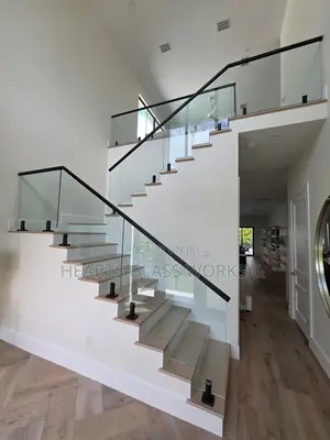 Modern Spigot Staircase Glass Railing Installation