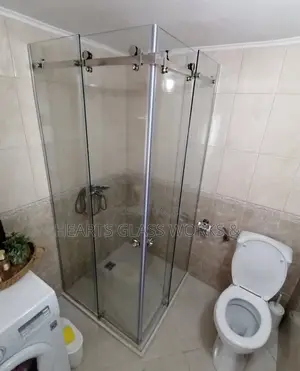 Modern and Space-Saving Sliding Bathroom Door With Toughened Glass