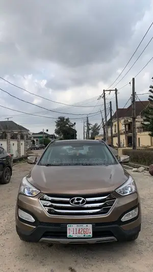 Hyundai Santa Fe Limited 4dr SUV AWD (3.3L 6cyl 6A) 2015 Brown