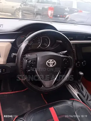 Toyota Corolla L 4dr Sedan (1.8L 4cyl 4A) 2014 Red