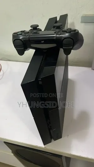 PlayStation 4 With 3 Games and One Controller