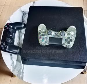 HACKED PS4 SLIM With 8-Games, FC-27, Gta 5, Mk-11, Watch Dogs-2, COD,