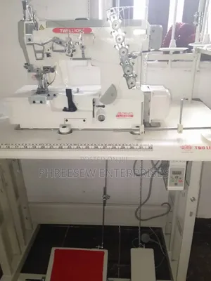 Cover-Stitch Interlock/ Taping Machine