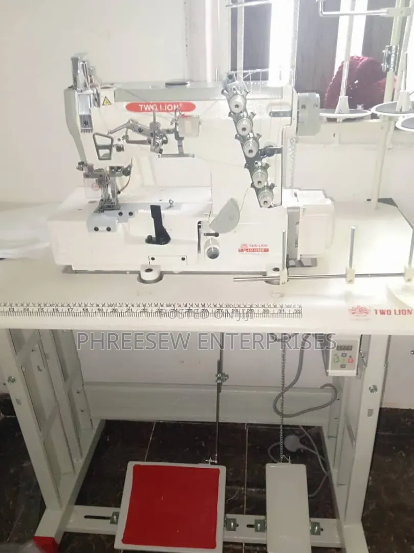 Cover-Stitch Interlock/ Taping Machine
