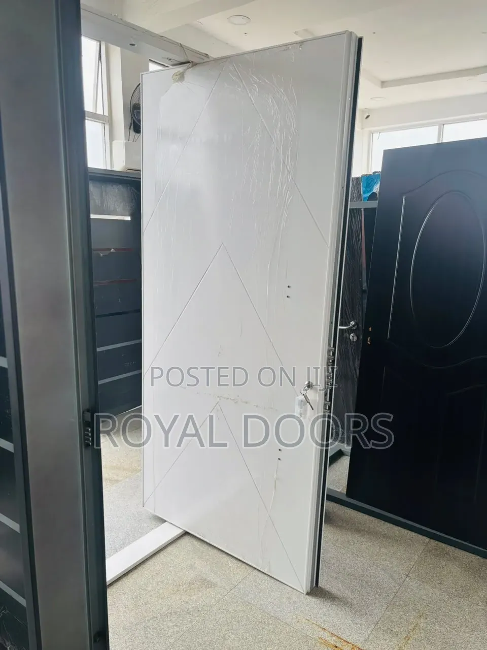 White Pivot Security Door