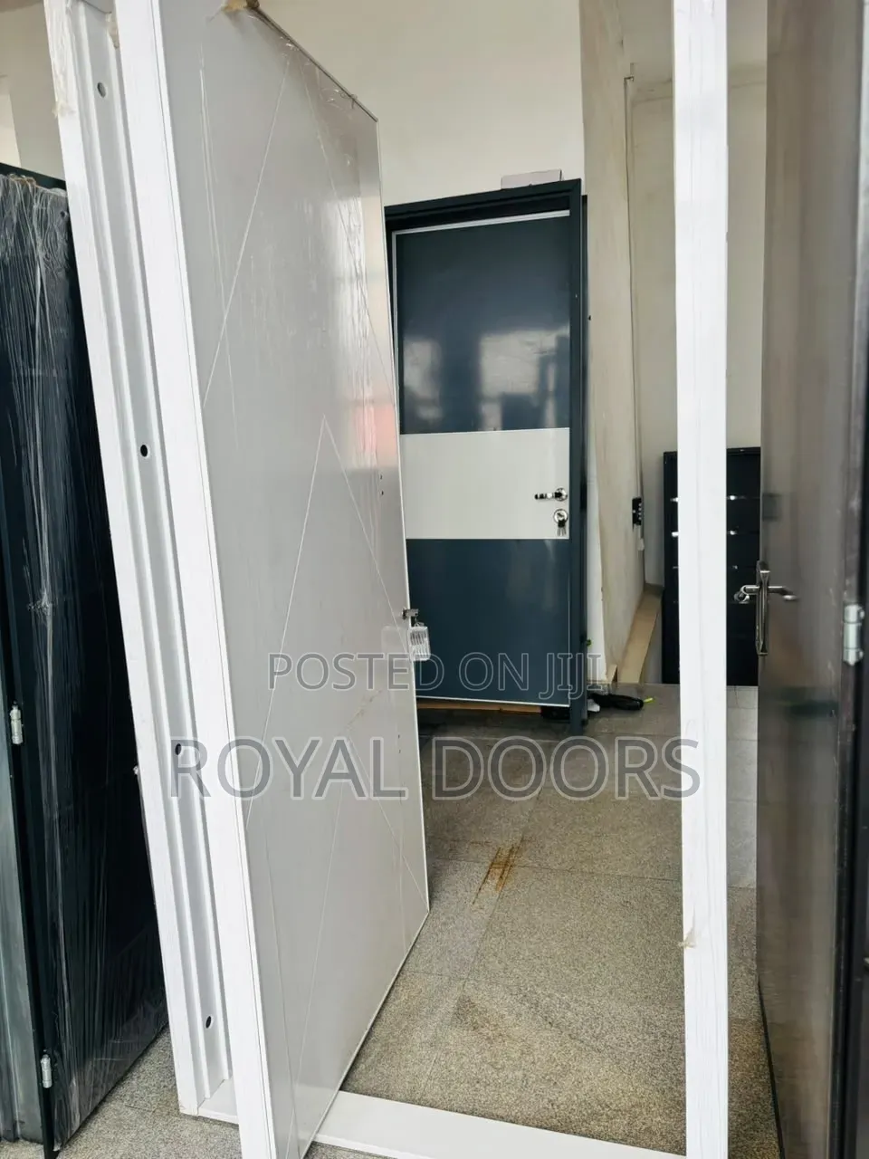 White Pivot Security Door