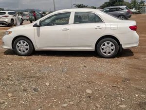 Toyota Corolla LE 4dr Sedan (1.8L 4cyl 4A) 2010 White