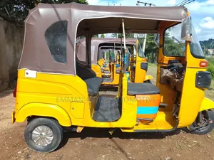 Bajaj RE 2023 Yellow