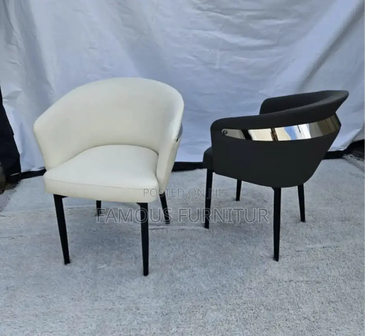 Modern Barrel-Back Dining Chairs Feature Smooth Leather Upholstery