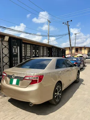 Toyota Camry LE 4dr Sedan (2.5L 4cyl 6A) 2013 Gold