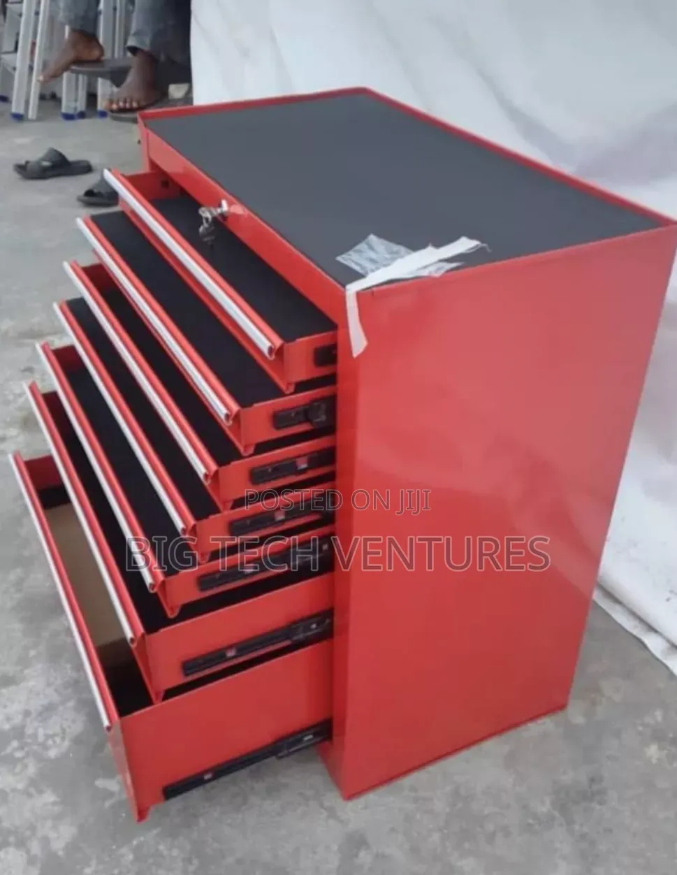 This Appears to Be a Red, 7-Drawer Rolling Tool Chest and Storage