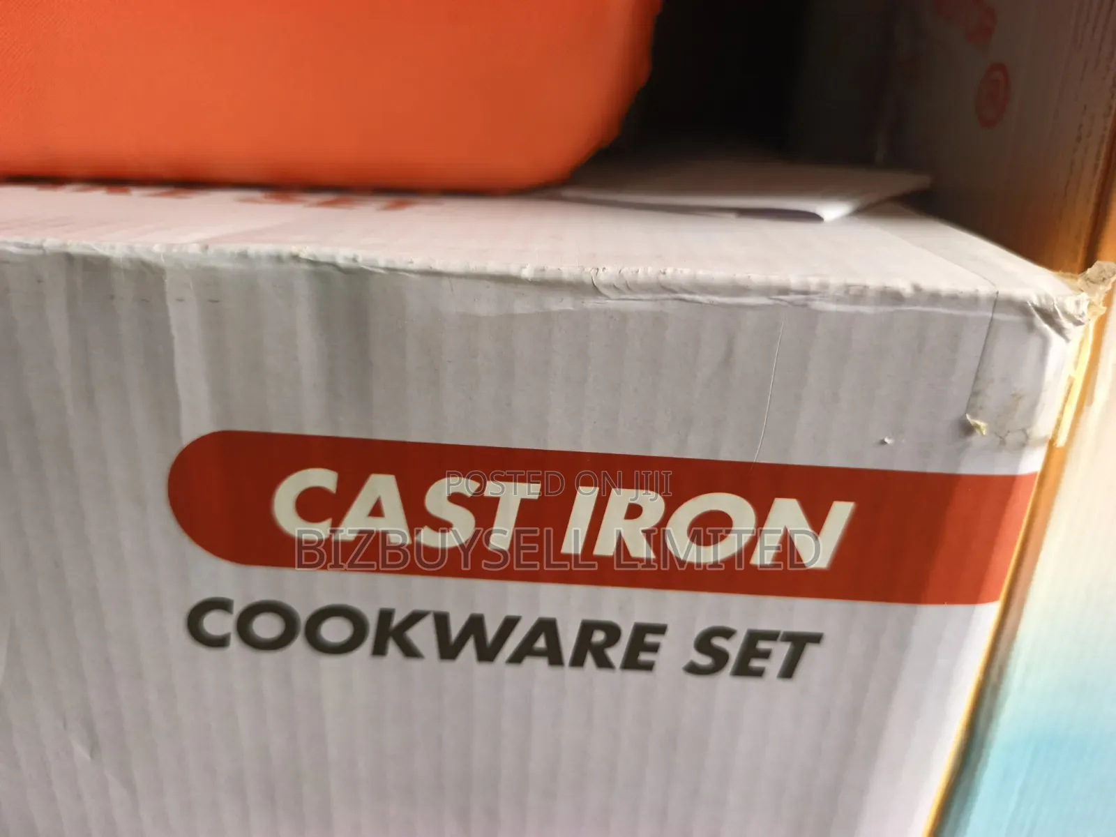7-Piece Enameled Cast Iron Cookware Set Featuring Red-Orange Dutch