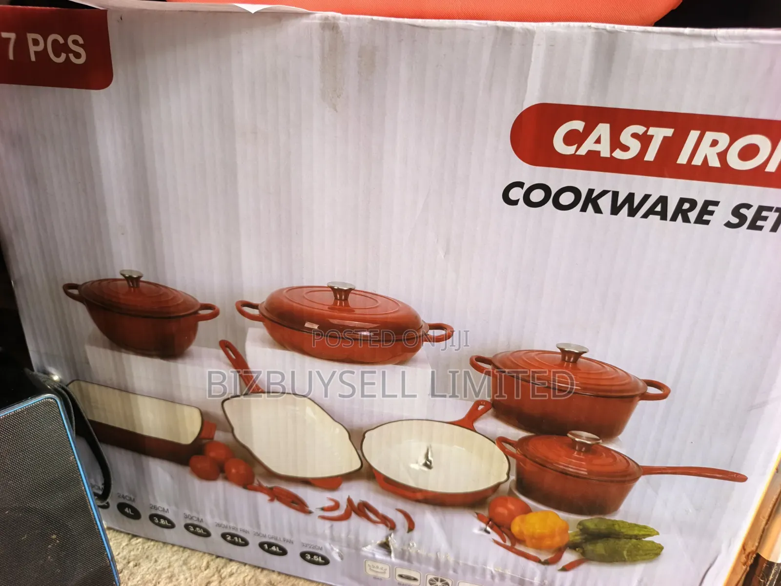 7-Piece Enameled Cast Iron Cookware Set Featuring Red-Orange Dutch