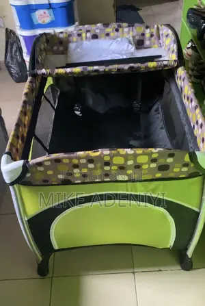 Neatly Used Baby Bed With Accessories
