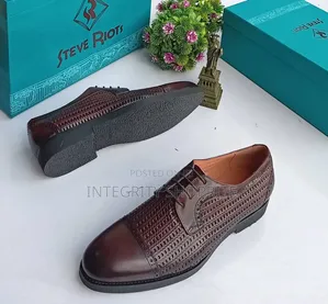 Brown Woven Cap-Toe Derby.