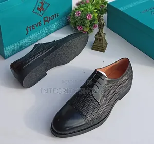 Brown Woven Cap-Toe Derby.