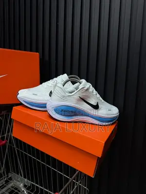 Nike Zoomx Vomero Plus - White / Photo Blue