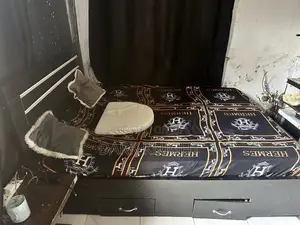 6 Ft. X 6.5 Ft. X 20 In. Mattress and Bed Frame.