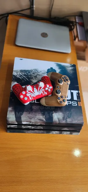 Playstation 4 Pro With Games and 4 Pad