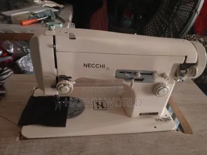 Manual/Electric Sewing Machine