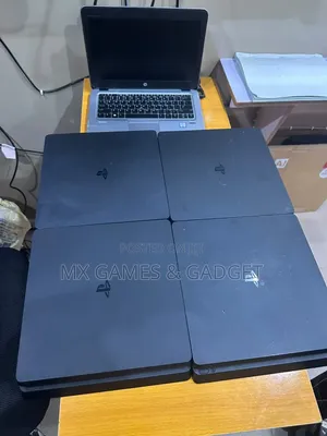 Playstation 4 Slim UK Used Clean With Games and 2 Pad
