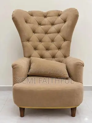 Tufted Upholstered Armchair.