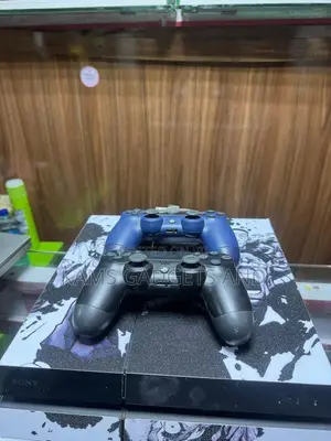 Fat Ps4 With 2 Controllers and Games