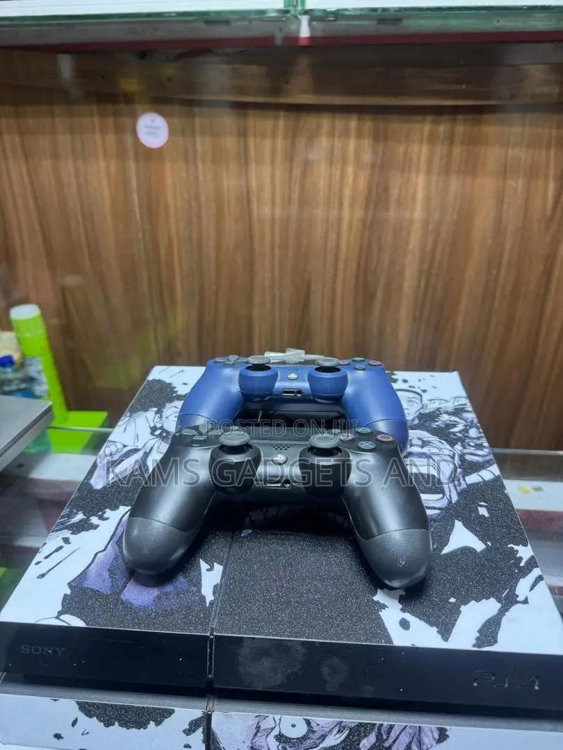 Fat Ps4 With 2 Controllers and Games