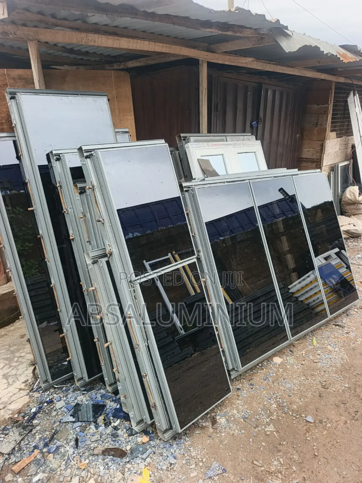 Three Panel of Frameless Windows With Burglary