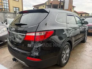 Hyundai Santa Fe Limited w/Saddle Interior 4dr SUV AWD (3.3L 6cyl 6A)