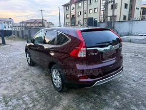 Honda CR-V EX-L w/Navigation 4dr SUV (2.4L 4cyl CVT) 2015 Red
